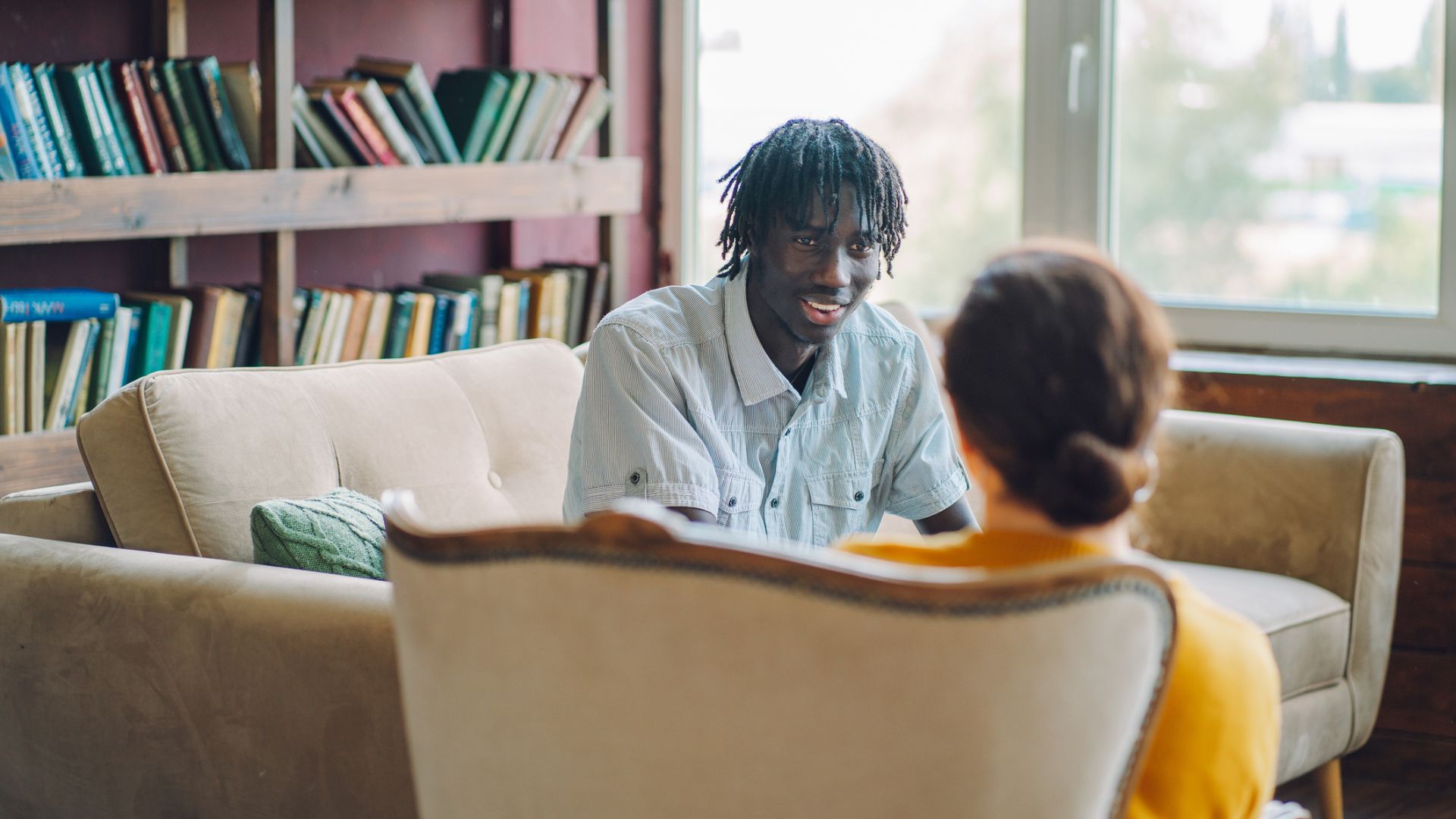 A man talking to a woman councillor in therapy about his sleep problems