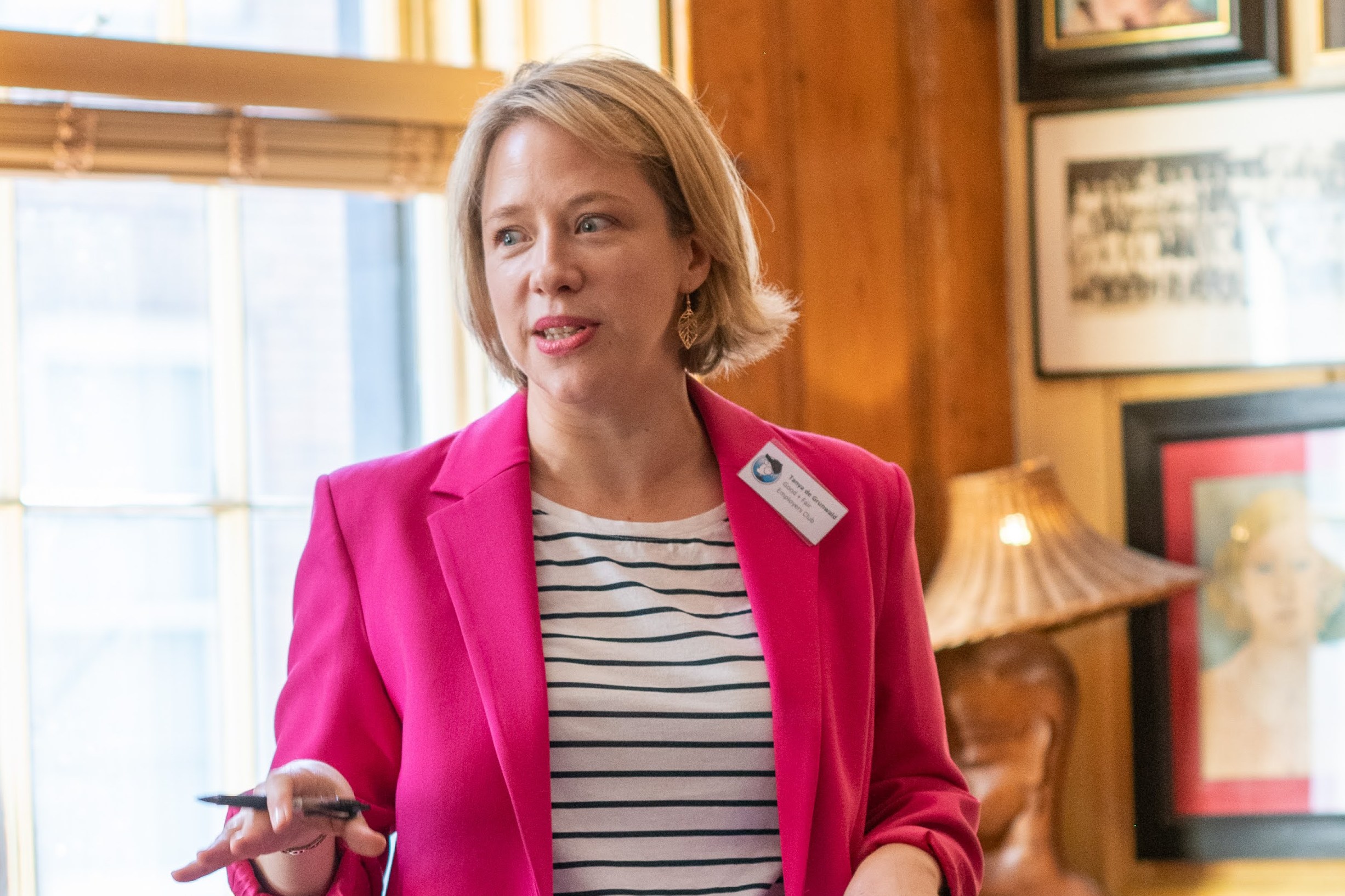 Tanya de Grunwald, founder of The Good + Fair Employers Club, speaking at an event.