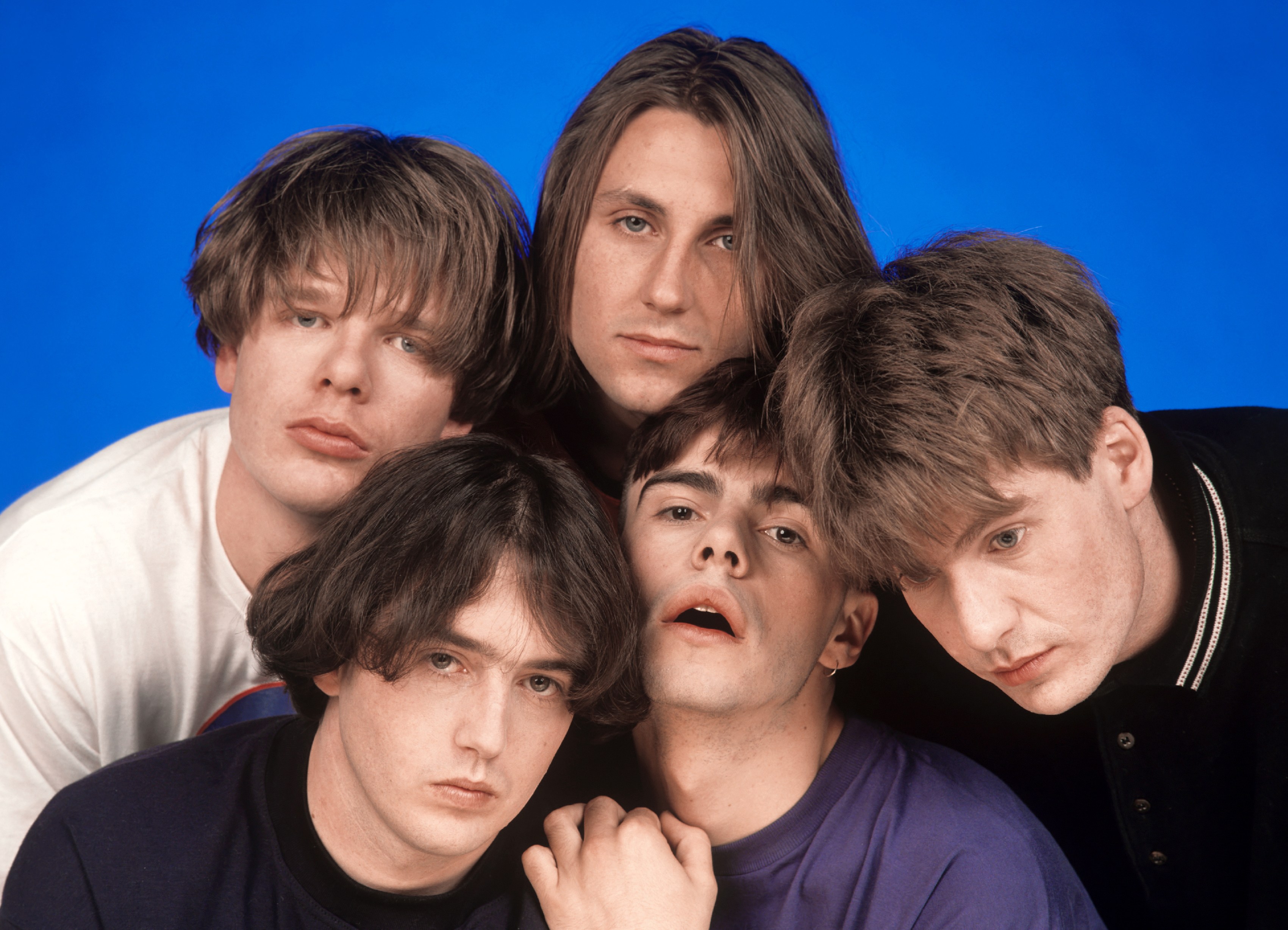 The Charlatans band members, clockwise from bottom left: Mark Collins, John Baker, Jon Brookes, Martin Blunt, Tim Burgess.