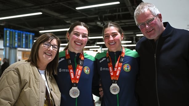 17 March 2025; Aoife, right, and Lisa O'Rourke of Ireland with the silver medals they won in their respective Elite Women 70-75kg middleweight and 66-70kg light middleweight final bouts at the 2025 IBA Women's World Boxing Championships finals are congratulated by mam, Ann, and dad, Kevin, upon thei
