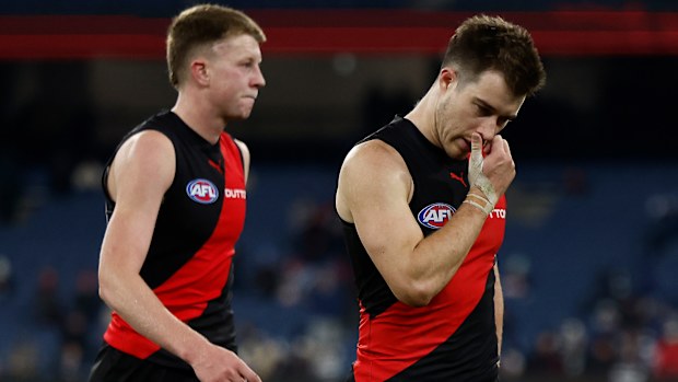 Zach Merrett of the Bombers looks dejected after a loss.