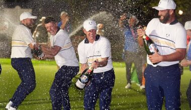 Donald celebrates with Rory McIlroy by his side after Team Europe's historic win on US soil
