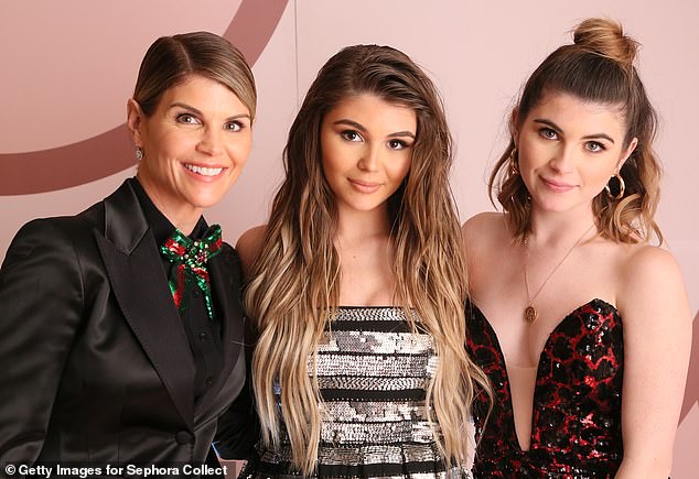 According to Page Six, Loughlin is currently residing at her family home in Hidden Hills, California, which was put on the market in February; pictured with Olivia Jade and Isabella Rose in 2018 in West Hollywood