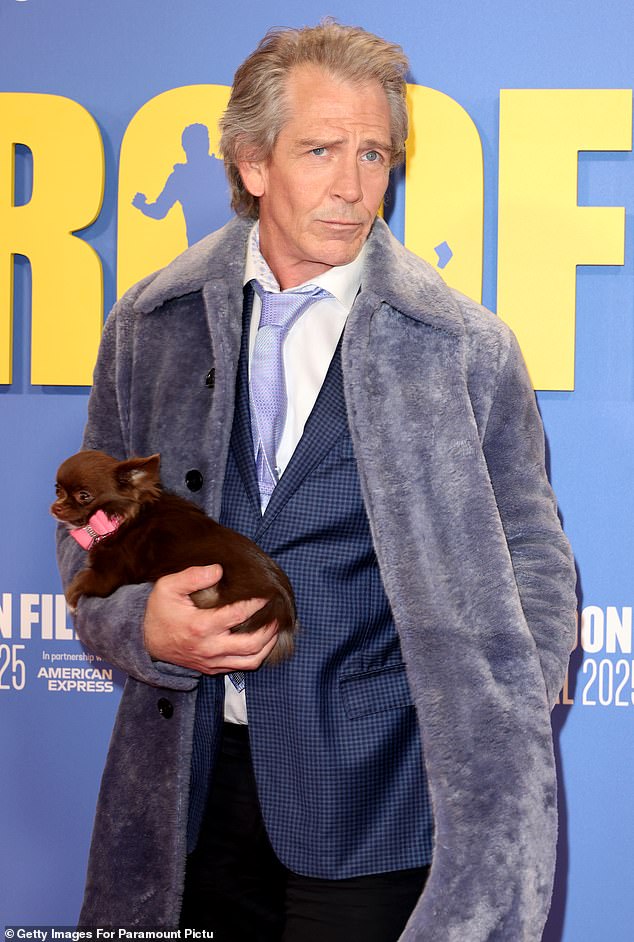 The Australian actor certainly made an entrance on Tuesday as he rocked up at Royal Festival Hall with a chocolate-coloured chihuahua in hand