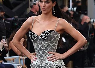 Kendall Jenner, 29, went full showgirl glam as she wore Nicole Kidman 's iconic Moulin Rouge costume as she strutted on the catwalk for the star-studded Vogue World 2025 show