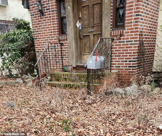 The yard was overgrown and residents in the neighborhood called the construction site an eyesore in the time it was abandoned
