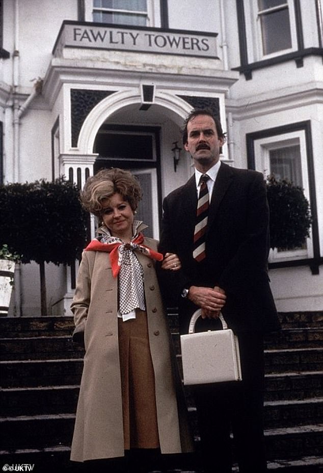 John Cleese shared snaps with his late Fawlty Towers co-stars Prunella and Nicky Henson on Thursday after the former's death earlier this week (seen as Basil and Sybil Fawlty)