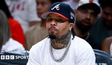 Gervonta Davis wearing a baseball cap and white t-shirt