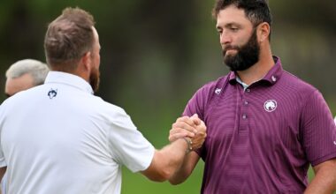 Shane Lowry and Jon Rahm shake hands after completing the second round in Madrid