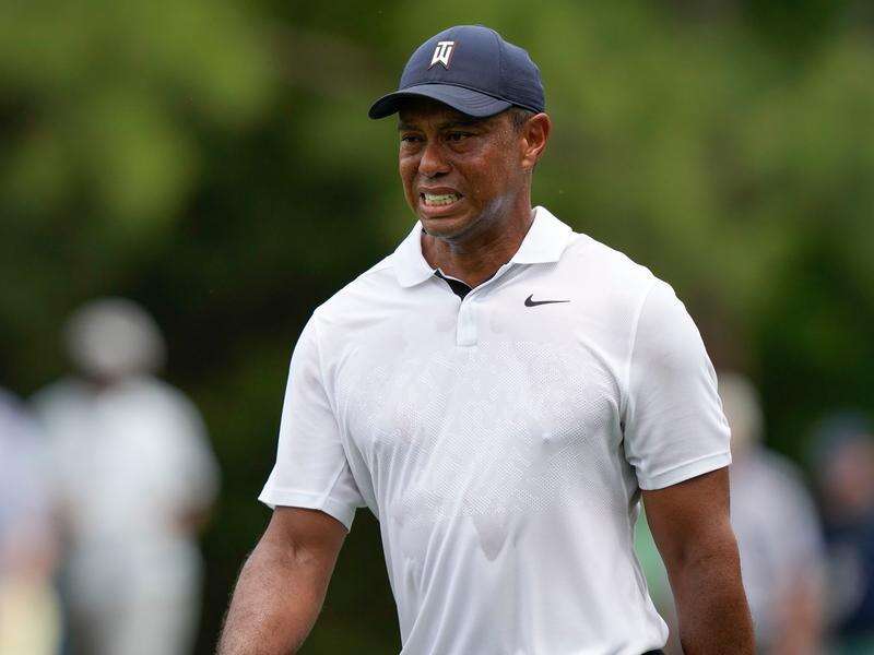 Down but not out: Tiger has seventh back surgery