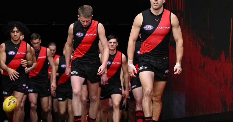 Essendon captain Zach Merrett (right) is in trade limbo as he tries to join Hawthorn. Photo: Joel Carrett/AAP PHOTOS