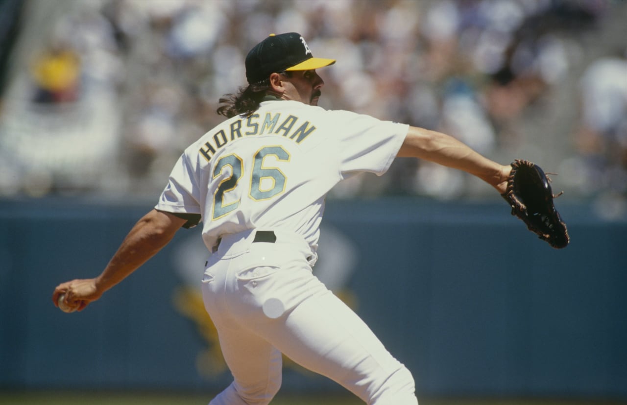 A left-handed pitcher throws.