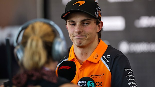 A disappointed Oscar Piastri speaks in the media pen during the F1 Grand Prix of United States.