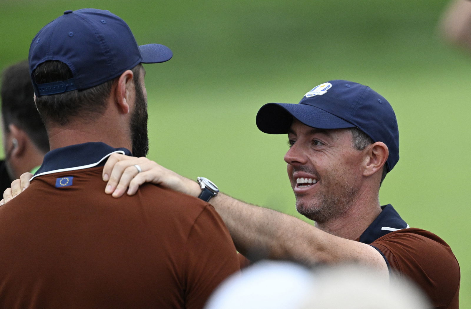 Rahm with McIlroy at the Ryder Cup