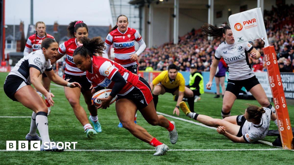 Jade Shekells (second left) runs over the tryline to score for Gloucester-Hartpury