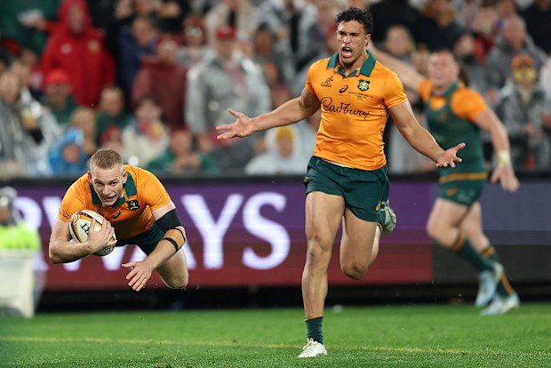 Max Jorgensen of the Wallabies dives over to score a try.