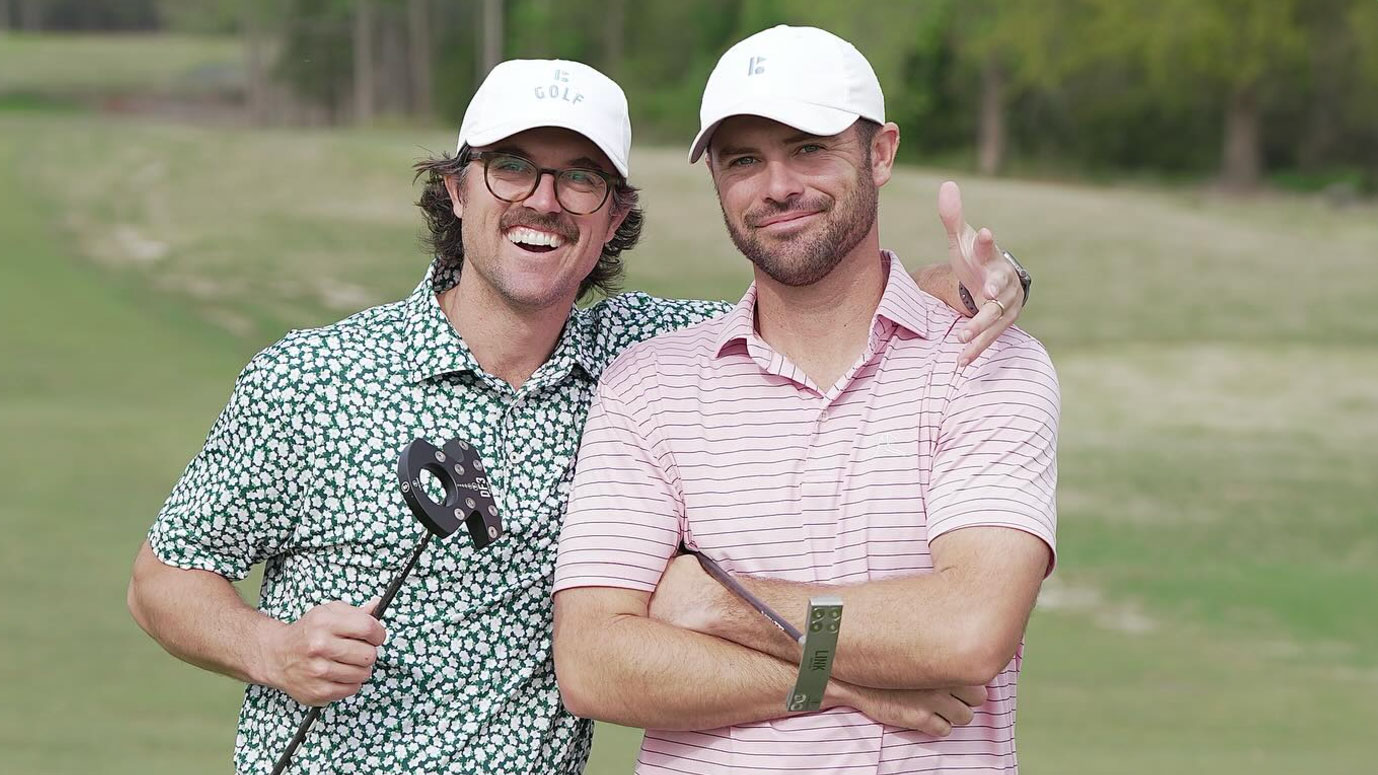 Photo of Wesley and George Bryan using their L.A.B. putters