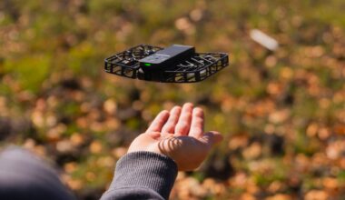 The HoverAir X1 hovering above a hand