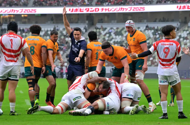 Wallabies overcome rain, injuries to secure tense Japan victory
