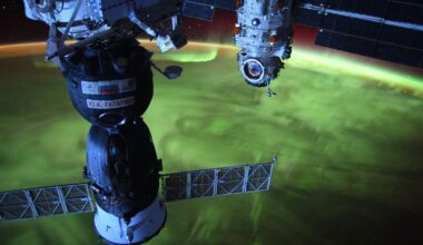 Photo taken from the ISS showing part of the station hovering above the northern lights