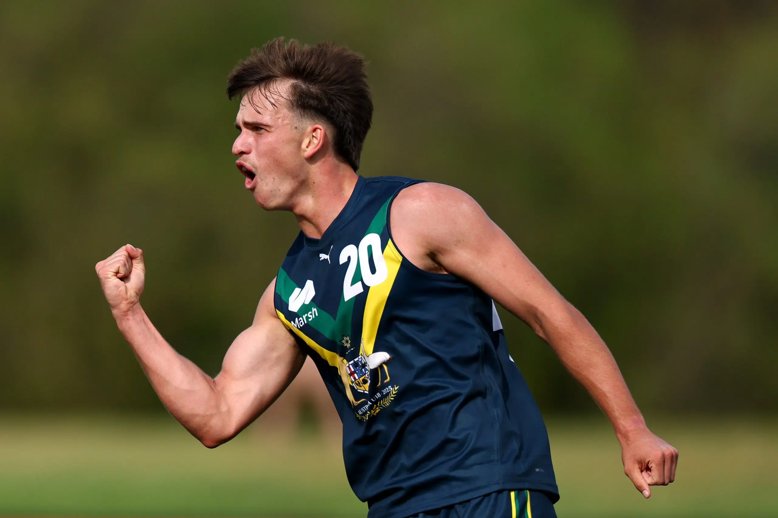 MELBOURNE, AUSTRALIA - APRIL 13: Daniel Annable of the AFL National Academy celebrates kicking a goal during the Marsh AFL National Academy Boys match between Australia U18 and Richmond VFL at RSEA Park on April 13, 2025 in Melbourne, Australia. (Photo by Josh Chadwick/AFL Photos)