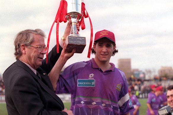 Taliadoros lifts the Johnnie Walker Cup.