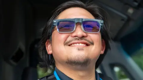 Amazon An Amazon delivery driver wearing the tech giant's prototype smart glasses.