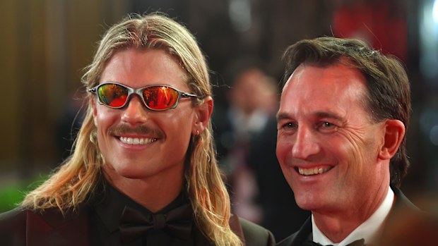 Bailey Smith of the Cats and Andrew Dillon, Chief Executive Officer of the AFL are seen during the 2025 Brownlow Medal 