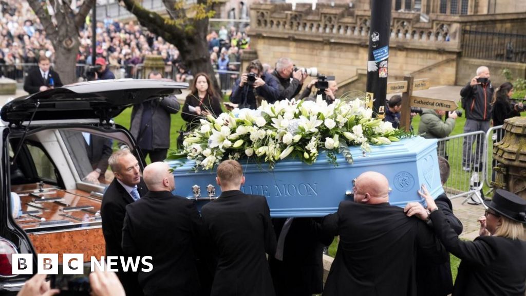 Thousands line streets for Ricky Hatton's funeral in Manchester