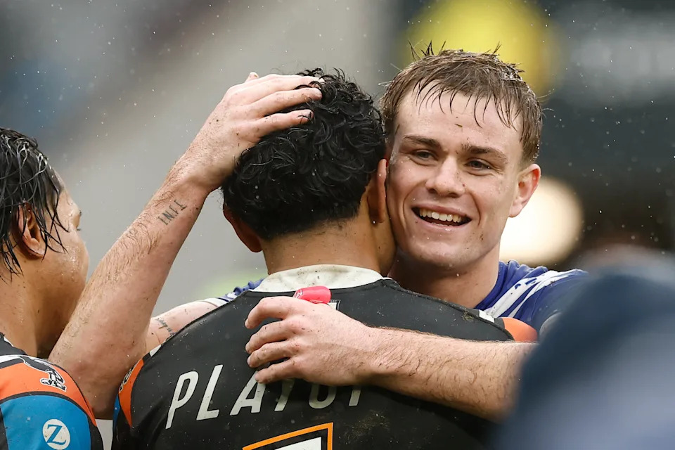 Lachlan Galvin hugs Jahream Bula.