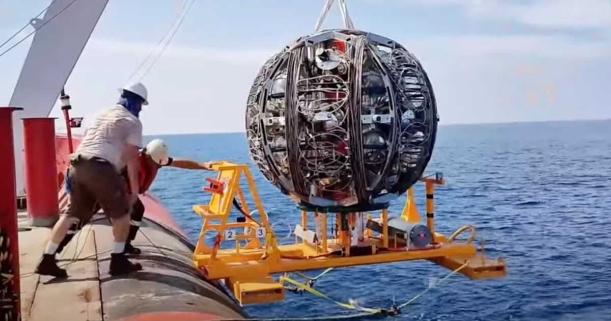 A particle from the farthest reaches of the universe has been detected at the bottom of the Mediterranean Sea.