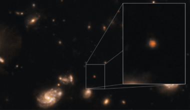 Galaxies in the far universe with a mysterious orange dot