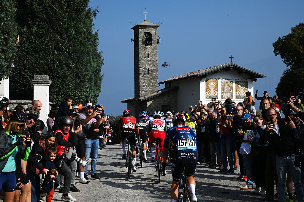 BERGAMO, ITALY - OCTOBER 11: A general view of Thibault Guernalec of France and Team Arkea - B&amp;B Hotels, Mattia Bais of Italy and Team Team Polti VisitMalta, Gal Glivar of Slovenia and Team Alpecin - Deceuninck and Louis Vervaeke of Belgium and Team Soudal Quick-Step compete in the breakaway while fans cheers during the 119th Il Lombardia 2025 a 241km one day race from Como to Bergamo on October 11, 2025 in Bergamo, Italy. (Photo by Dario Belingheri/Getty Images)