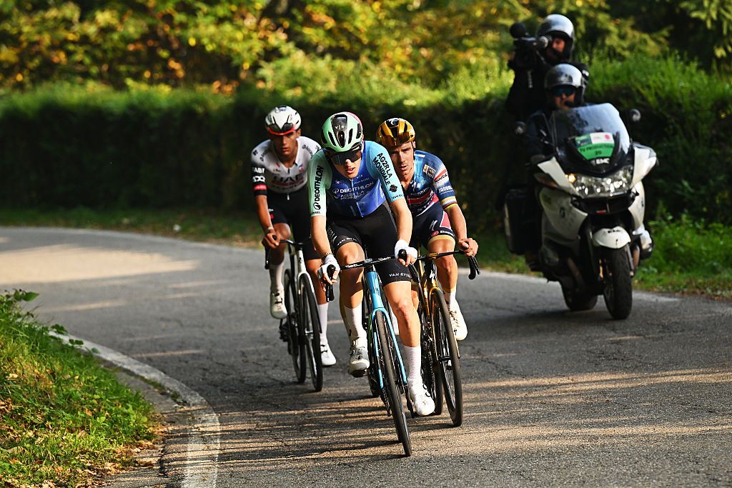 BERGAMO, ITALY - OCTOBER 11: (L-R) Paul Seixas of France and Team Decathlon AG2R La Mondiale and Remco Evenepoel of Belgium and Team Soudal Quick-Step compete in the chase group during the 119th Il Lombardia 2025 a 241km one day race from Como to Bergamo on October 11, 2025 in Bergamo, Italy. (Photo by Dario Belingheri/Getty Images)