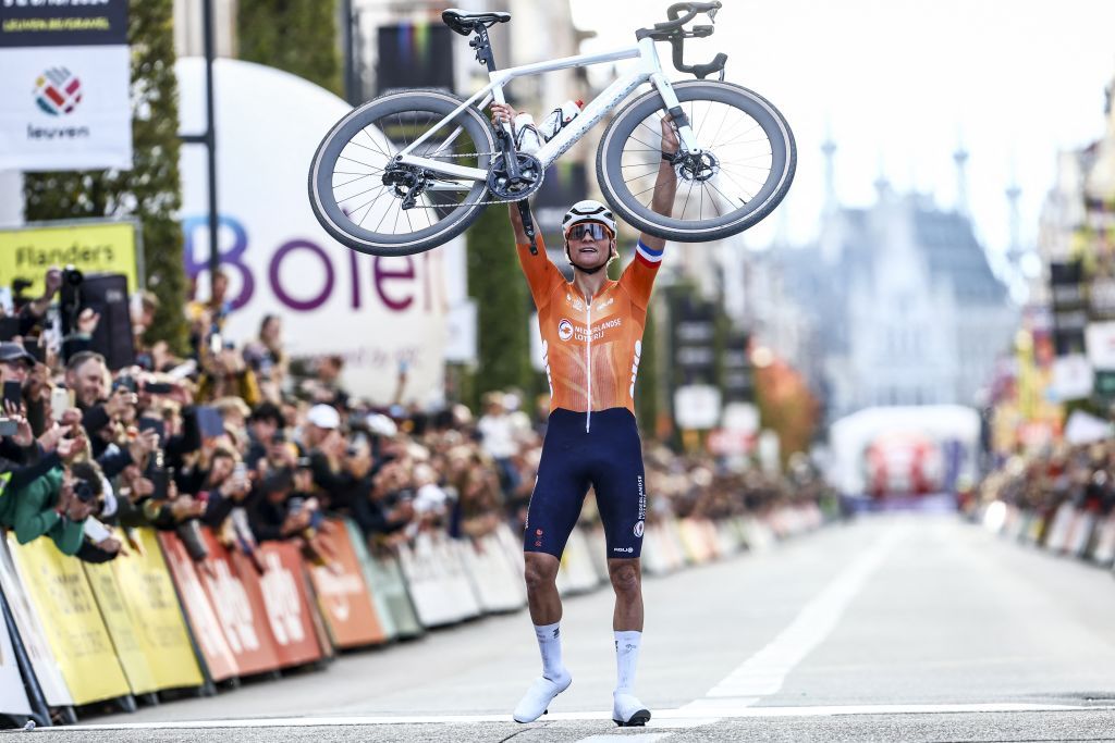 Dutch Mathieu van der Poel of Alpecin-Deceuninck celebrates as he crosses the finish line to win the men elite race at the UCI World Gravel Championships, Sunday 06 October 2024, in Leuven. BELGA PHOTO DAVID PINTENS (Photo by DAVID PINTENS / BELGA MAG / Belga via AFP)