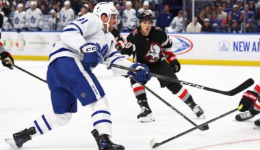 Maple Leafs and Sabres players sport Blue Jays jerseys during walk-ins