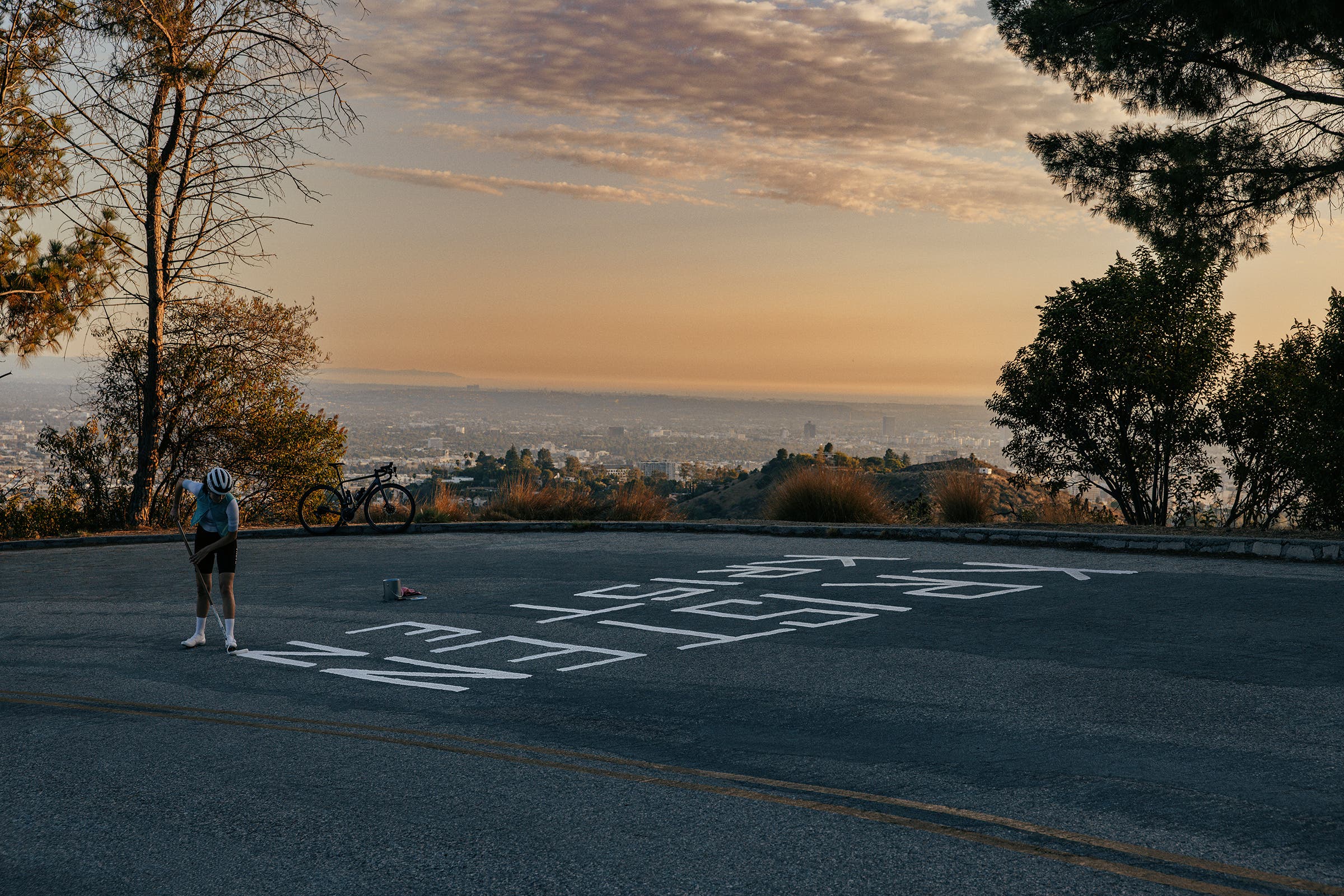 Rapha cyclists paints on ground
