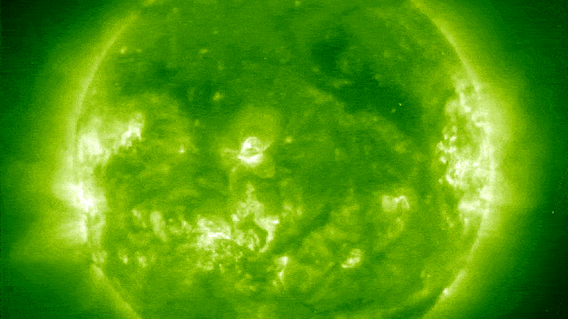 Looped video footage showing interference to satellites trained on the sun during a solar flare