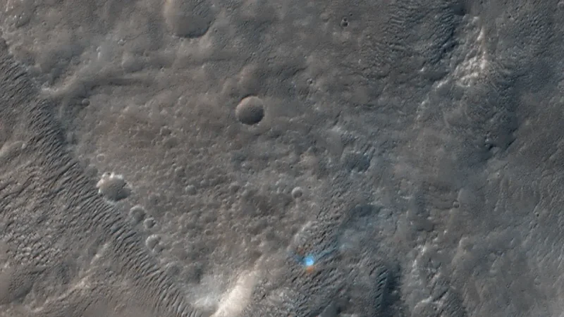 Cratered surface from above, with 2 positions of a dust devil, animated.