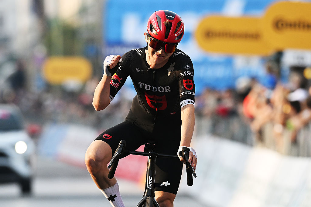BERGAMO, ITALY - OCTOBER 11: (EDITOR'S NOTE: Alternate crop) Michael Storer of Australia and Team Tudor Pro Cycling crosses the finish line as third place winner during the 119th Il Lombardia 2025 a 241km one day race from Como to Bergamo on October 11, 2025 in Bergamo, Italy. (Photo by Dario Belingheri/Getty Images)