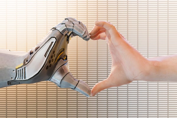 A robot and human hand forming a heart to suggest a futuristic dating concept.