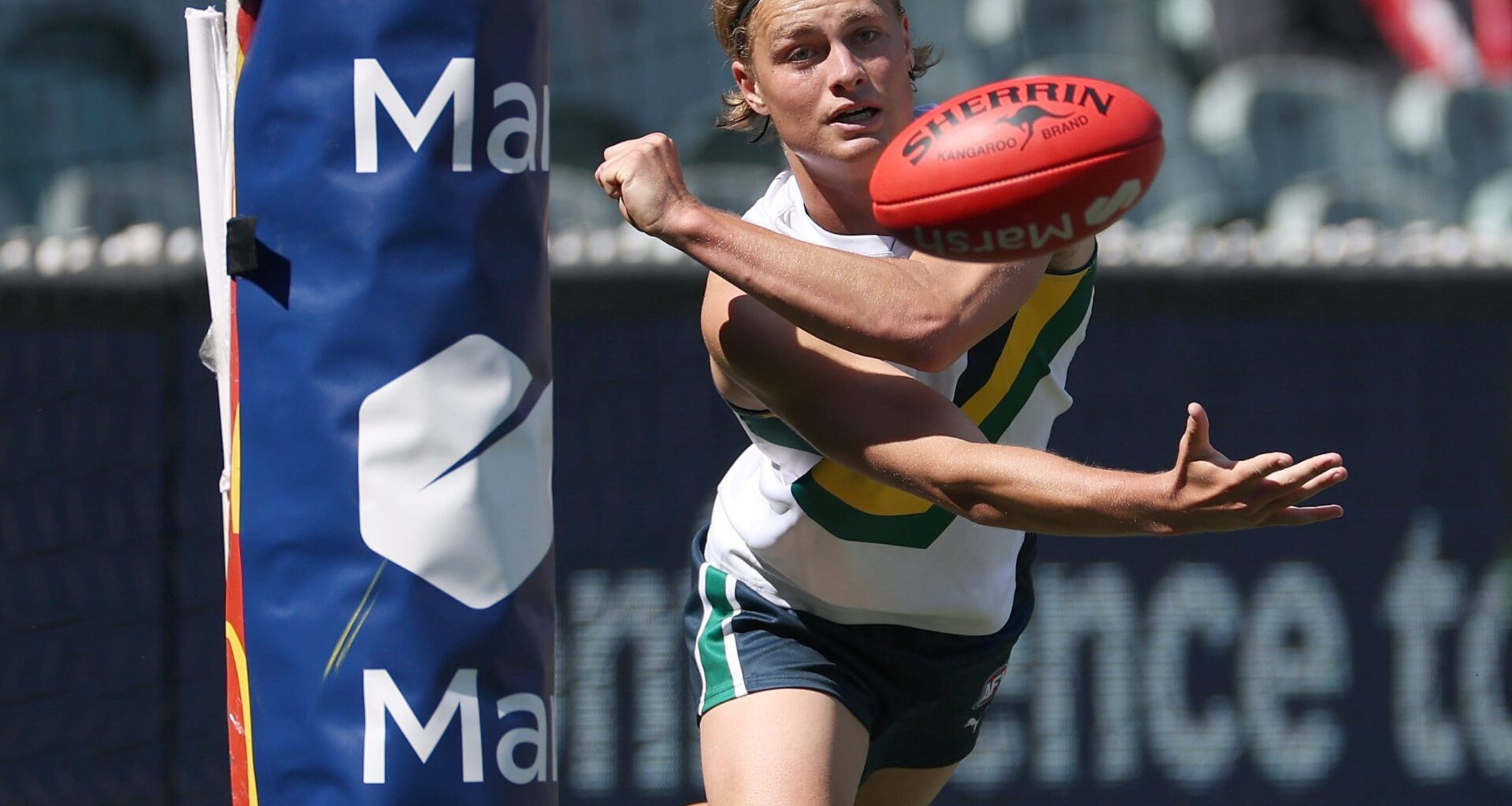 MELBOURNE, AUSTRALIA - SEPTEMBER 28: Jai Murray of Team Sloane handballs during the Marsh AFL National Futures Boys match between Team Heppell and Team Sloane at Melbourne Cricket Ground, on September 28, 2024, in Melbourne, Australia. (Photo by Daniel Pockett/AFL Photos/via Getty Images)