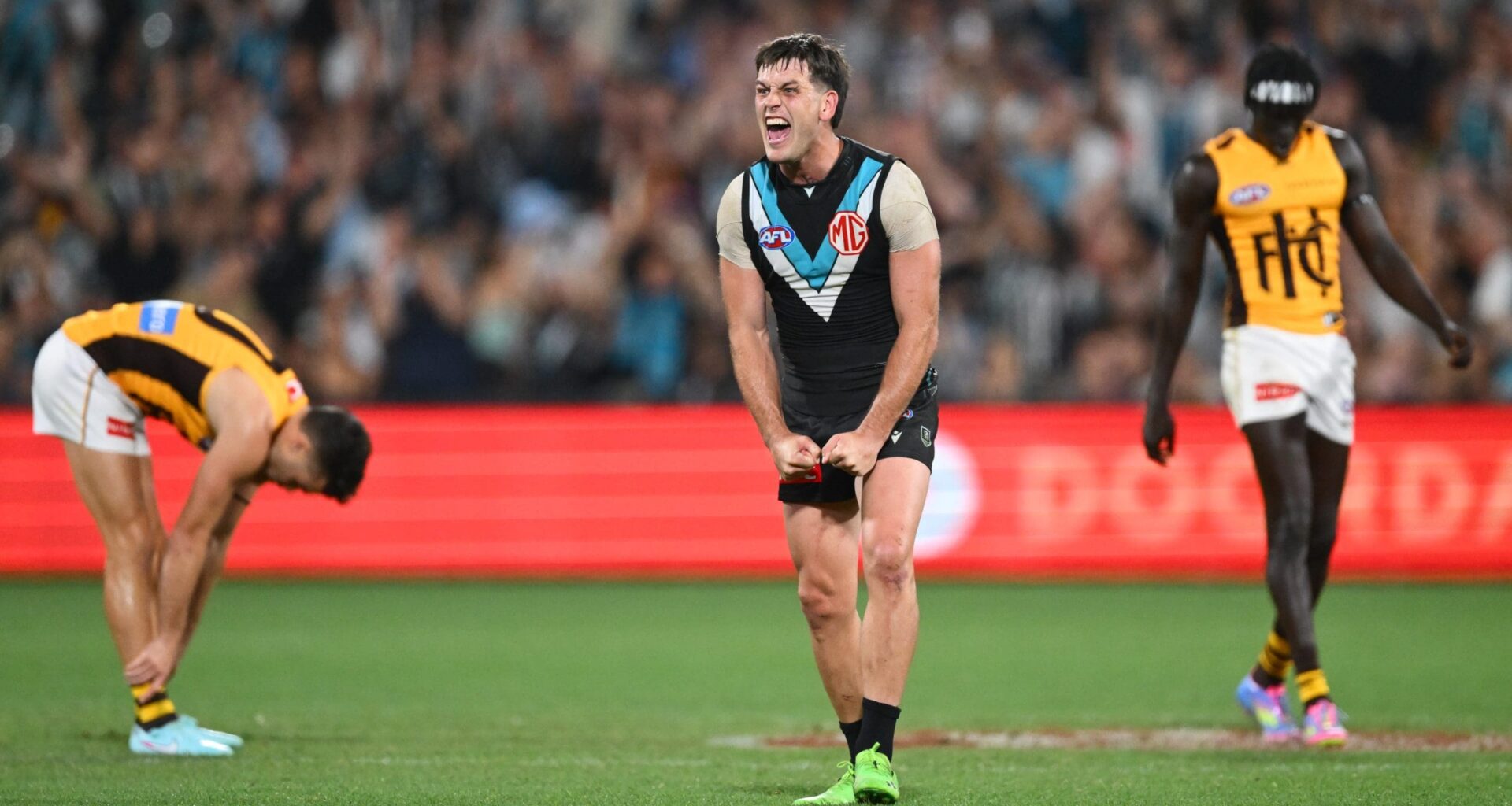 ADELAIDE, AUSTRALIA - APRIL 13: Zak Butters of the Power celebrates at full time during the round five AFL match between Port Adelaide Power and Hawthorn Hawks at Adelaide Oval, on April 13, 2025, in Adelaide, Australia. (Photo by Quinn Rooney/Getty Images)