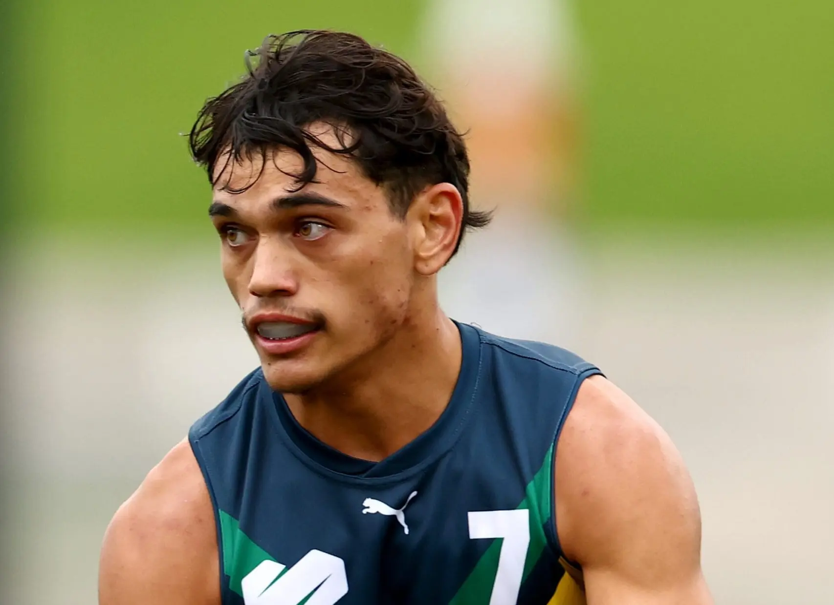 MELBOURNE, AUSTRALIA - APRIL 27: Dylan Patterson of the AFL National Academy kicks during the Marsh AFL National Academy Boys match between Australia U18 and Coburg VFL at Whitten Oval on April 27, 2025 in Melbourne, Australia. (Photo by Josh Chadwick/AFL Photos/via Getty Images)