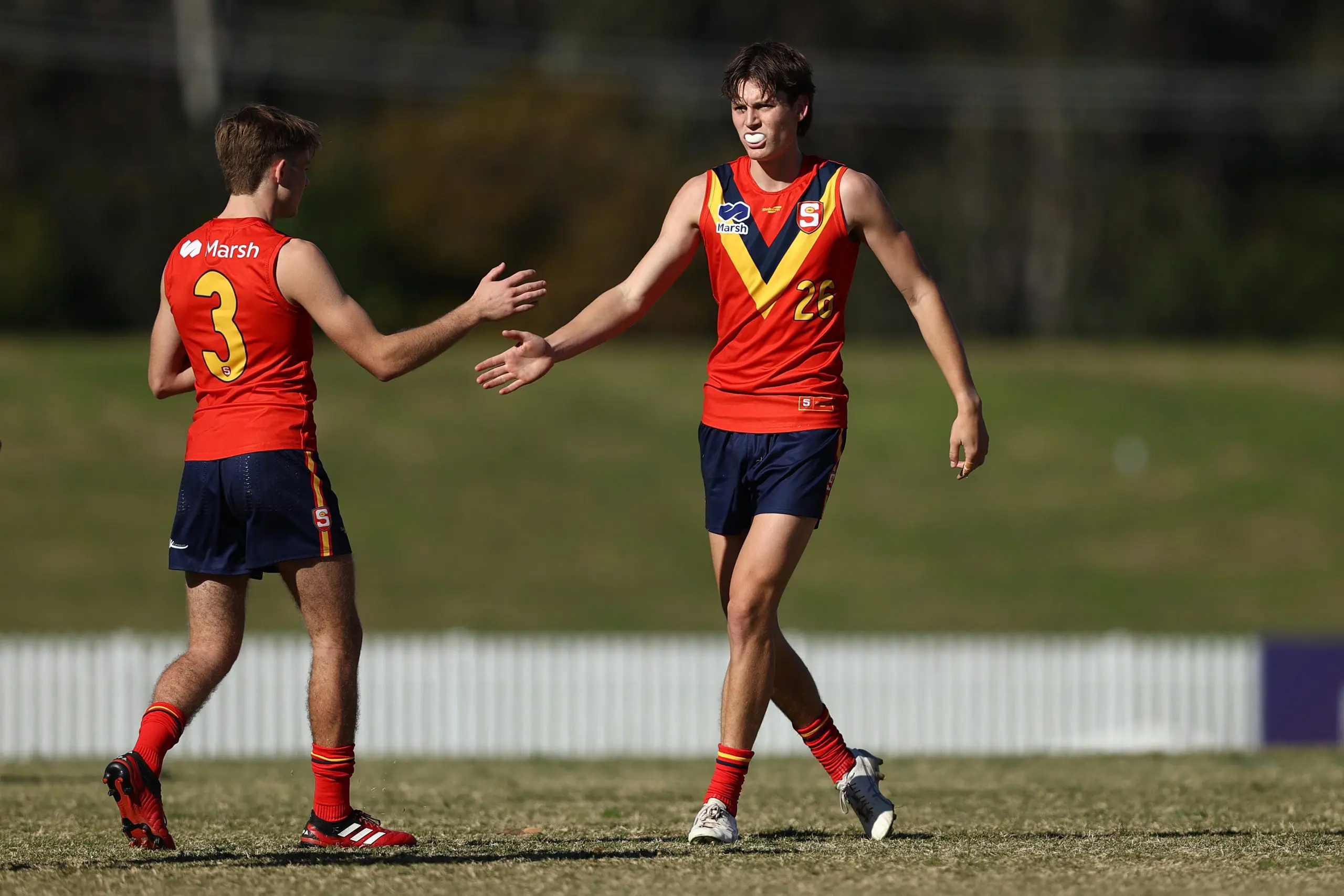 SYDNEY, AUSTRALIA - JUNE 01: Mitchell Marsh (R) of South Australia celebrates kicking a goal with saduring the Marsh AFL National Championships U18 Boys match between Allies and South Australia at Blacktown International Sportspark on June 01, 2025 in Sydney, Australia. (Photo by Jason McCawley/AFL Photos/via Getty Images)