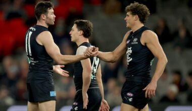 MELBOURNE, AUSTRALIA - JULY 10: Mitch McGovern of the Blues is congratulated by Charlie Curnow after kicking a goal during the round 18 AFL match between Carlton Blues and Brisbane Lions at Marvel Stadium on July 10, 2025 in Melbourne, Australia. (Photo by Robert Cianflone/Getty Images)