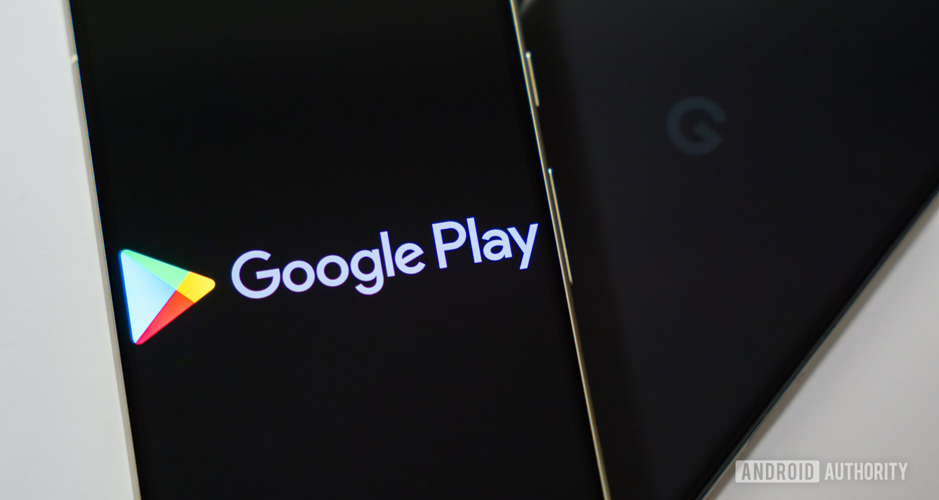 Google Play Store logo on smartphone stock photo (4)