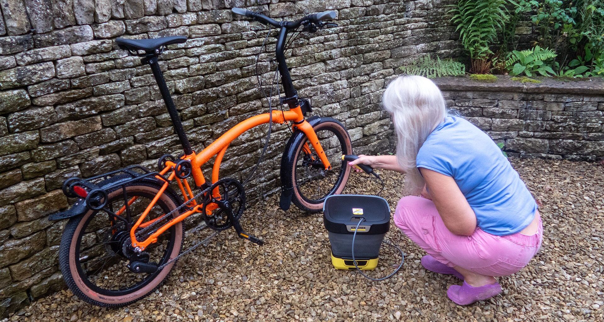 K&auml;rcher Mobile Cleaner OC 3 Foldable being used to wash a Brompton bike.