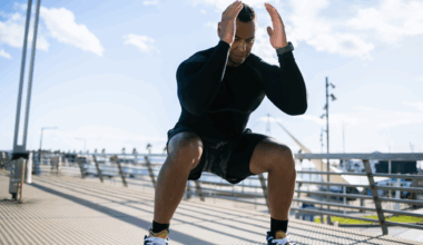 A man doing a squat outdoors