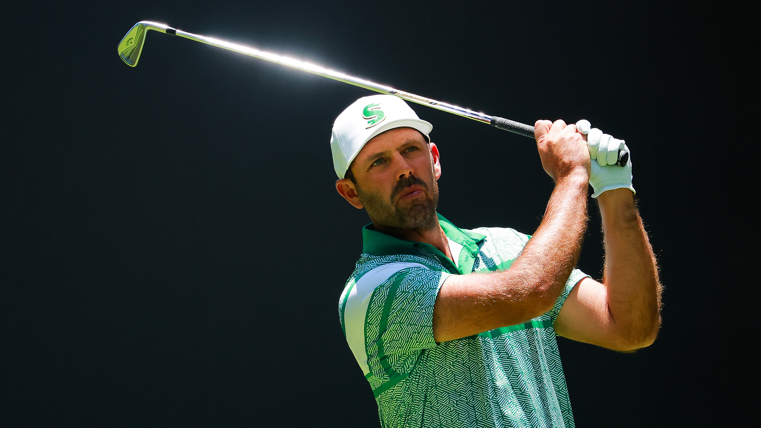 Charl Schwartzel hits an iron shot during LIV Golf Mexico 2025